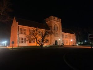 Albert College, Belleville, ON lit up in orange