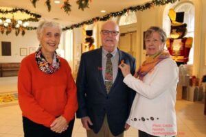 Orange ribbons: Beth Madole, Coburg (ON) Mayor Gil Brocanier, and Bonnie Symons
