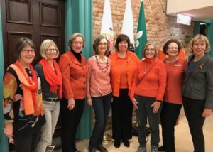 Group of GRANs in orange shirts