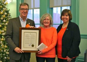 Ottawa Mayor Jim Watson, Hilary Elliott GRAN co-chair, and Anita Vandenbeld MP with Orange Campaign Proclamation