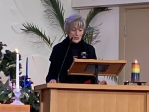 Victoria GRAN, Liz Dill, speaks at memorial service on December 6, Canada's National Day of Remembrance and Action on Violence Against Women
