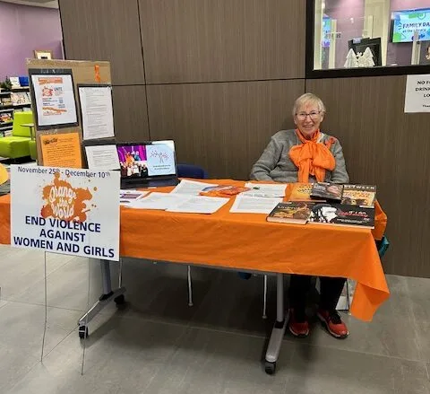 Info table set up at Brighton Public Library