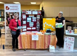 Info table with two GRAN members at Coquitlam library