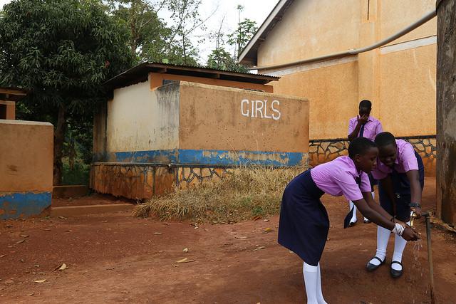 School girls outside girls-only washroom